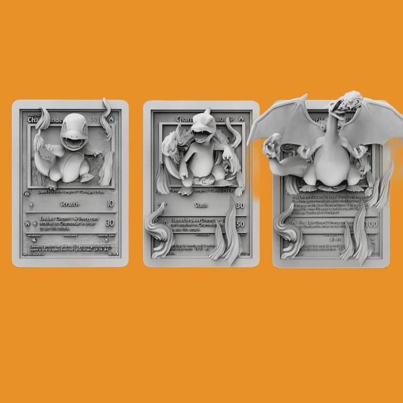May include: Three 3D printed Pokemon cards featuring Charmander, Charmeleon, and Charizard. The cards are white and gray and have a textured surface. The Pokemon are depicted in a 3D style, with Charmander and Charmeleon standing on their hind legs and Charizard flying with its wings spread.