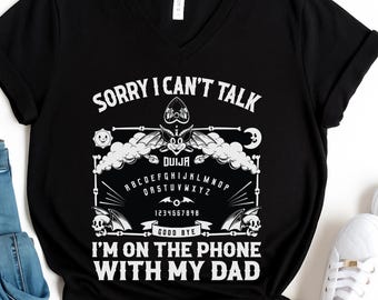 Sorry I Can't Talk I'm On The Phone With My Dad Ouija Board V-Neck T-shirt, Ouija Board Shirt, Halloween shirts, Funny Spiritual Graphic