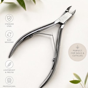 May include: Stainless steel nail and cuticle clippers. The clippers are rust-resistant, lightweight, and precise. The text on the image says "Perfect for nails & cuticles" and "Built for clean, precise cuts every time."
