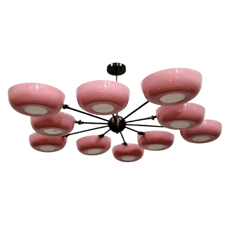 May include: A modern chandelier featuring ten pink, speckled, bowl-shaped shades. The shades are suspended from a central black hub by slender black arms. The light fixtures have white interiors.