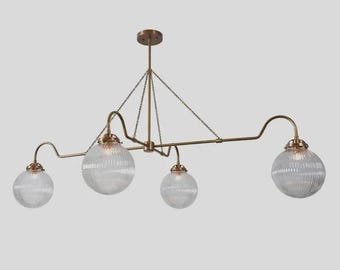 Four globe chandelier modern brass metal light with ribbed glass shades for dining room island or living area fixture home decor accent