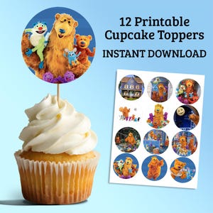May include: A cupcake topped with white frosting and a round topper featuring cartoon bears and friends. The image also shows a sheet of 12 printable cupcake toppers with various character designs. Text on the image reads "12 Printable Cupcake Toppers INSTANT DOWNLOAD."