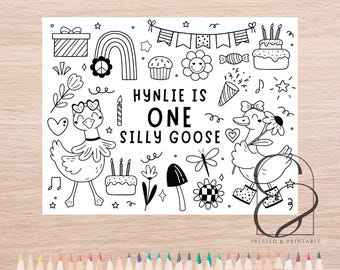 May include: Black and white line art illustration with the text "HYNLIE IS ONE SILLY GOOSE". The image includes a gift, rainbow, cupcake, flower, cake, and other whimsical doodles. A row of colored pencils is at the bottom.