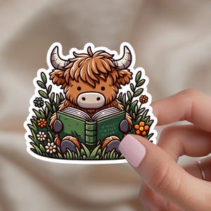 Highland Cow Reading Sticker – 2 Inch Water-Resistant Vinyl Sticker, Cute Cow Decal for Water Bottles, Laptops, Journals, E-Readers and More