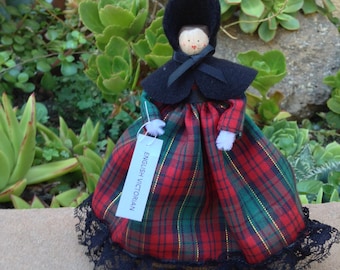 English Victorian clothespin doll, black, red, green dress