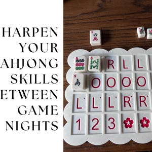 May include: A white Mahjong game board with red lettering and numbers. The board has a scalloped edge and is partially filled with tiles. The text "SHARPEN YOUR MAHJONG SKILLS BETWEEN GAME NIGHTS" is on the left.