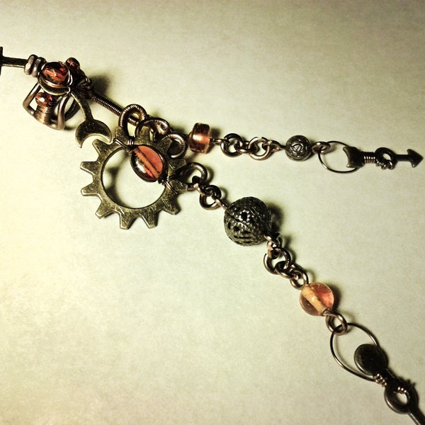 SlaveToSteampunk -The Trinket Collector Ear Cuff with gears, chains and amber beading