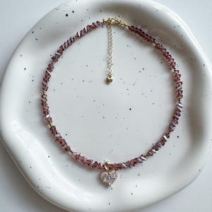 Pink Glass Choker with Heart Pendant and Gold-Tone Details