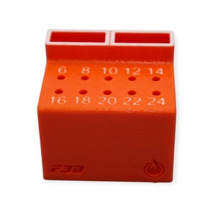 May include: An orange 3D-printed tool holder with numbered holes for various sizes. The holder has two top compartments and the numbers 6, 8, 10, 12, 14, 16, 18, 20, 22, and 24 are visible. The F3D logo is printed on the side.