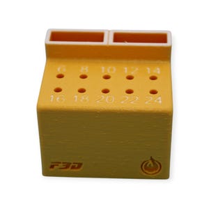 May include: A yellow 3D-printed tool holder with numbered holes for various sizes. The holder has two rectangular slots at the top and the numbers 6, 8, 10, 12, 14, 16, 18, 20, 22, and 24 are visible.