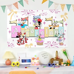 May include: A rectangular fabric banner featuring a colorful Disney birthday theme with the text Auroraland. Mickey Mouse, Minnie Mouse, Donald Duck, Daisy Duck, Goofy, and Pluto are illustrated in party hats. The background includes fireworks and bows.