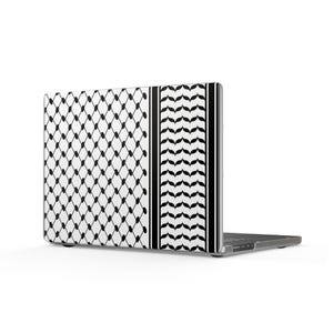 May include: A laptop computer featuring a protective skin on its lid. The skin displays a black and white keffiyeh pattern, characterized by a grid of diamond shapes on the left and a vertical column of repeating leaf-like motifs on the right.