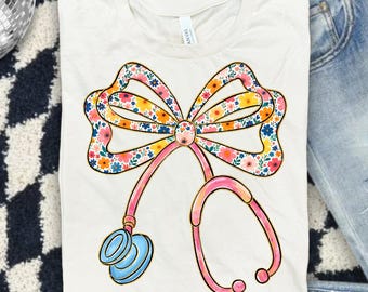 Floral Stethoscope Nurse Bow PNG, Coquette Nurse Bow PNG, Nurse Coquette Bow Stethoscope PNG, Nurse Coquette Png, Nurse Shirt Png Design.