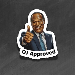 May include: A sticker showing a smiling man in a suit with a thumbs-up. The text "OJ Approved" is written in a bold, black font below the image. The sticker has a white border and is set against a dark grey background.