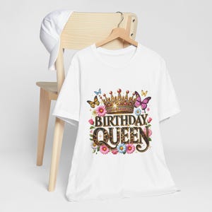 “Birthday Queen PNG design featuring a gold crown, leopard print text, colorful flowers, and butterflies — ideal for sublimation on t-shirts, mugs, and more.”