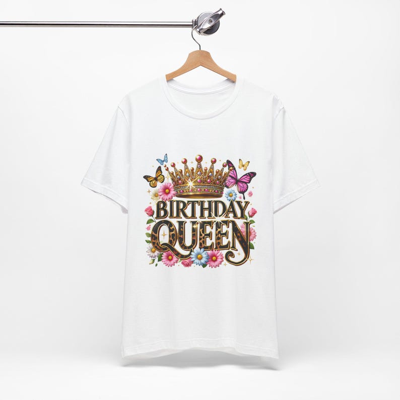 “Birthday Queen PNG design featuring a gold crown, leopard print text, colorful flowers, and butterflies — ideal for sublimation on t-shirts, mugs, and more.”