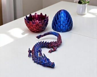 Drago articolato nell'uovo – Oggetto da collezione fantasy con effetto cangiante, stampato in 3D.