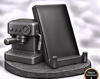 Könnte beinhalten: Ein mattschwarzer Handy- oder Tablethalter mit einem skulpturalen Espressomaschinen-Design auf der linken Seite. Der Halter hat eine glatte, abgewinkelte Rückenlehne und zwei vordere Stützen. Ein kreisförmiges Abzeichen zeigt Digital Download.