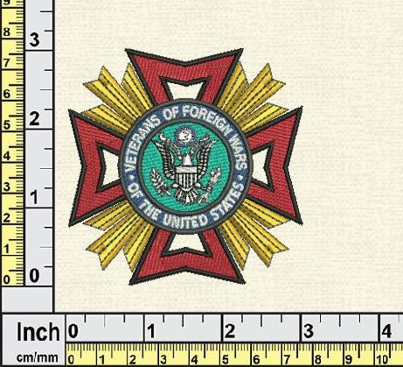 May include: Embroidered patch featuring the Veterans of Foreign Wars emblem. The design includes a red and gold cross shape with a central teal circle. The circle contains an eagle and the text "Veterans of Foreign Wars of the United States."