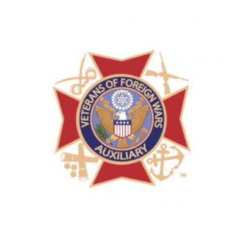 May include: A red and gold emblem with a central circular design featuring an eagle and shield, surrounded by the text "VETERANS OF FOREIGN WARS AUXILIARY." The emblem is set against a white background, with gold and red star-shaped elements.