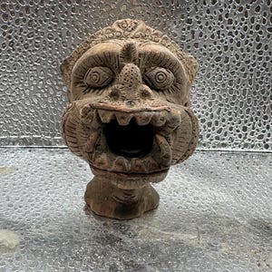Old antique Clay Tribal Art Grotesque Head Tusked Head Mythical Pottery Head