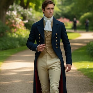 May include: A navy blue coat with gold buttons, worn over a tan vest and cream-colored shirt and cravat. The coat has a red lining. The person is wearing tan pants. The scene is set outdoors on a path.