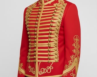 May include: A red military-style jacket with gold-colored embellishments. The jacket features a high collar, rows of gold buttons, and intricate gold embroidery on the sleeves and front. The design is reminiscent of historical military uniforms.