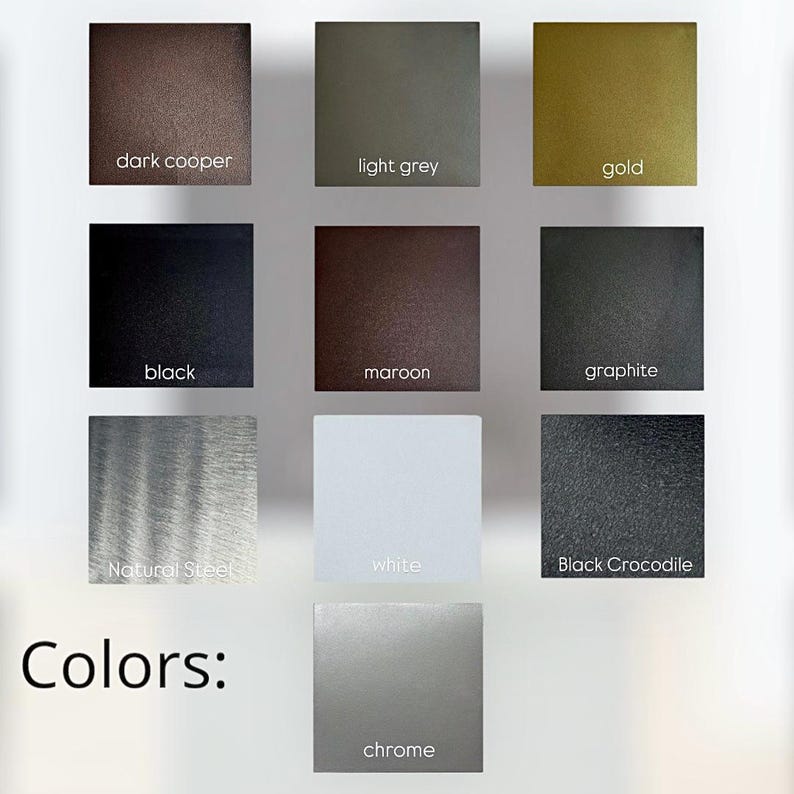 Puede incluir: Una paleta de colores que muestra diez muestras cuadradas etiquetadas como dark copper, light grey, gold, black, maroon, graphite, natural steel, white, black crocodile y chrome. La palabra Colors aparece en negro abajo a la izquierda.