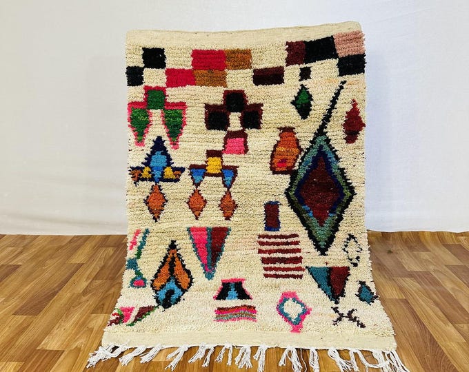 Traditional Berber Rug: Ivory Field with Vibrant Tribal Motifs