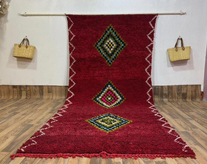 Natural Red Wool Rug: Hand-Loomed Moroccan Floor Covering with Eye Motifs
