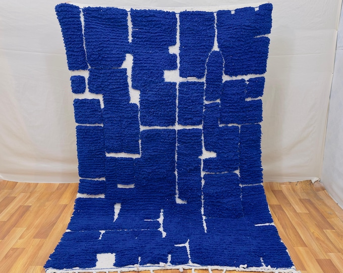Blue Wool Berber Rug: Hand-Knotted Tribal Design, Ethically Made.