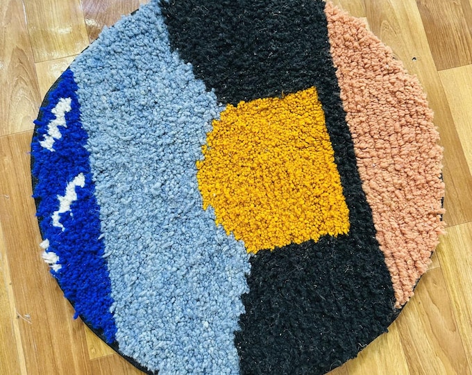 Handwoven Round Wool Moroccan Rug: Modern Abstract Art
