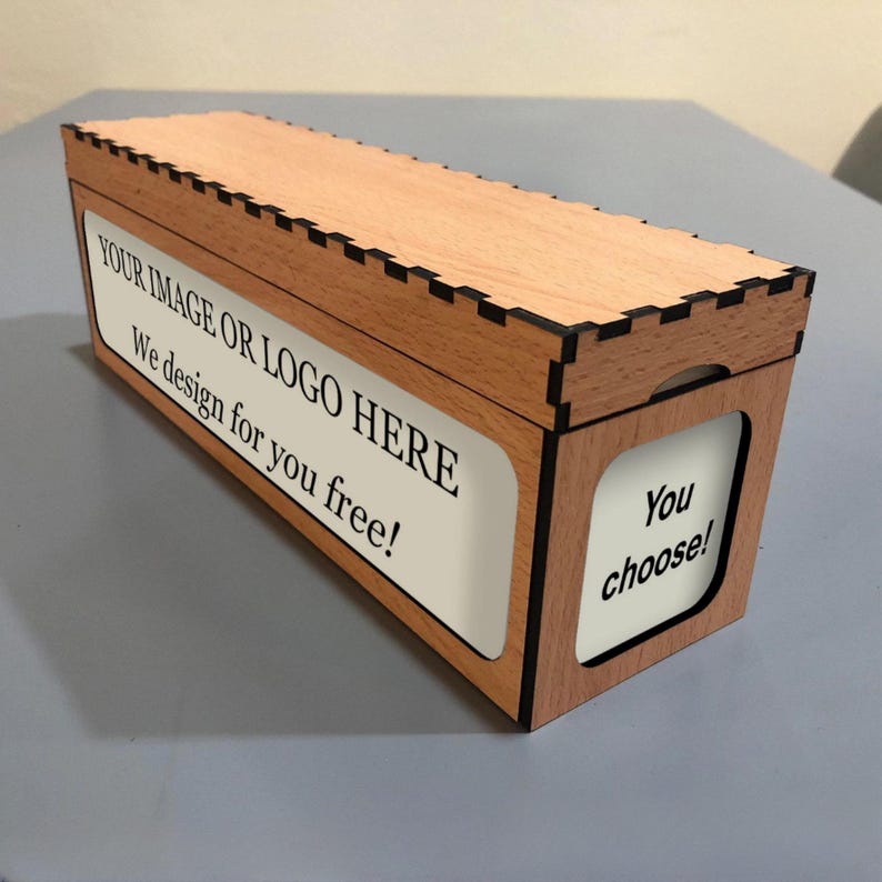 The image is a wooden box with a label that says "YOUR IMAGE OR LOGO HERE. We design for you free!" and a message that says "You choose!"
