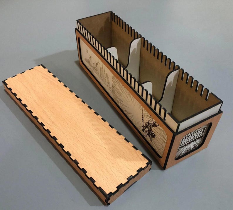 a wooden box with a Marvel-themed design, including a Marvel logo and a Marvel character.