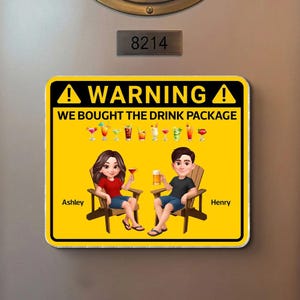 May include: A yellow sign with the text "WARNING WE BOUGHT THE DRINK PACKAGE" and illustrations of cocktails. It features cartoon figures of a woman and a man in chairs, with the names "Ashley" and "Henry" below them.