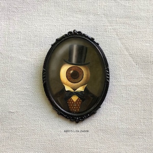 Science Fiction Gothic Victorian Eyeball Headed man Brooch, Oval Sci-Fi Steampunk Style for Halloween or Christmas