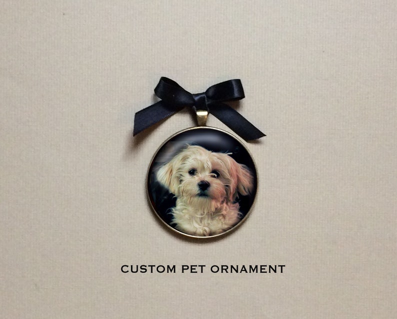 This custom pet portrait ornament using a photo of your dog or cat makes a unique gift and heartfelt memorial for any dog or cat owner.  Attach a photo of your pet. I will crop it and retouch it for optimum cuteness and send you a proof to approve.