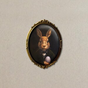 Rabbit Portrait Ornament Mysteriously holding an Egg 2 Round With Hanging Cord and Bow image 4