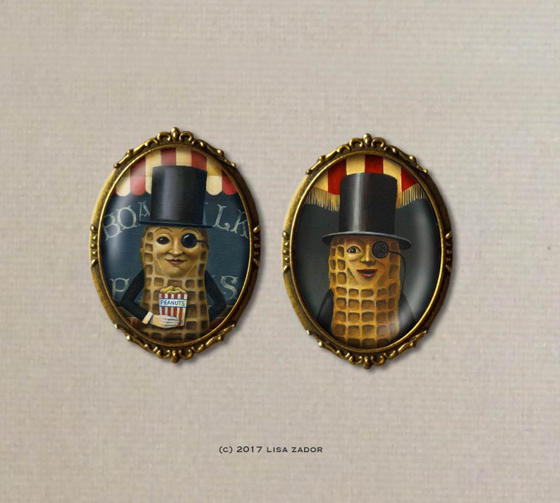 May include: Two oval-framed portraits feature anthropomorphic peanuts in top hats and suits. One holds a popcorn container labeled "Peanuts," the other wears a monocle. The frames have ornate gold detailing, set against a neutral background.