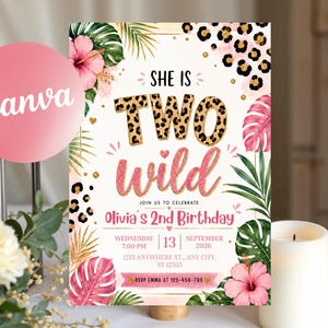 May include: A birthday invitation card featuring the text 'SHE IS TWO WILD' with leopard print lettering and pink glitter script. The design includes tropical palm leaves, pink hibiscus flowers, and leopard spots on a cream background with event details.