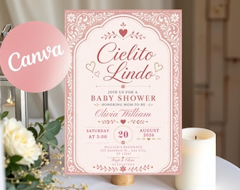 May include: A rectangular baby shower invitation card featuring a dusty rose and cream color palette with ornate floral borders. The text reads Cielito Lindo, Join us for a baby shower honoring mom-to-be Olivia William, Saturday August 20 2026.