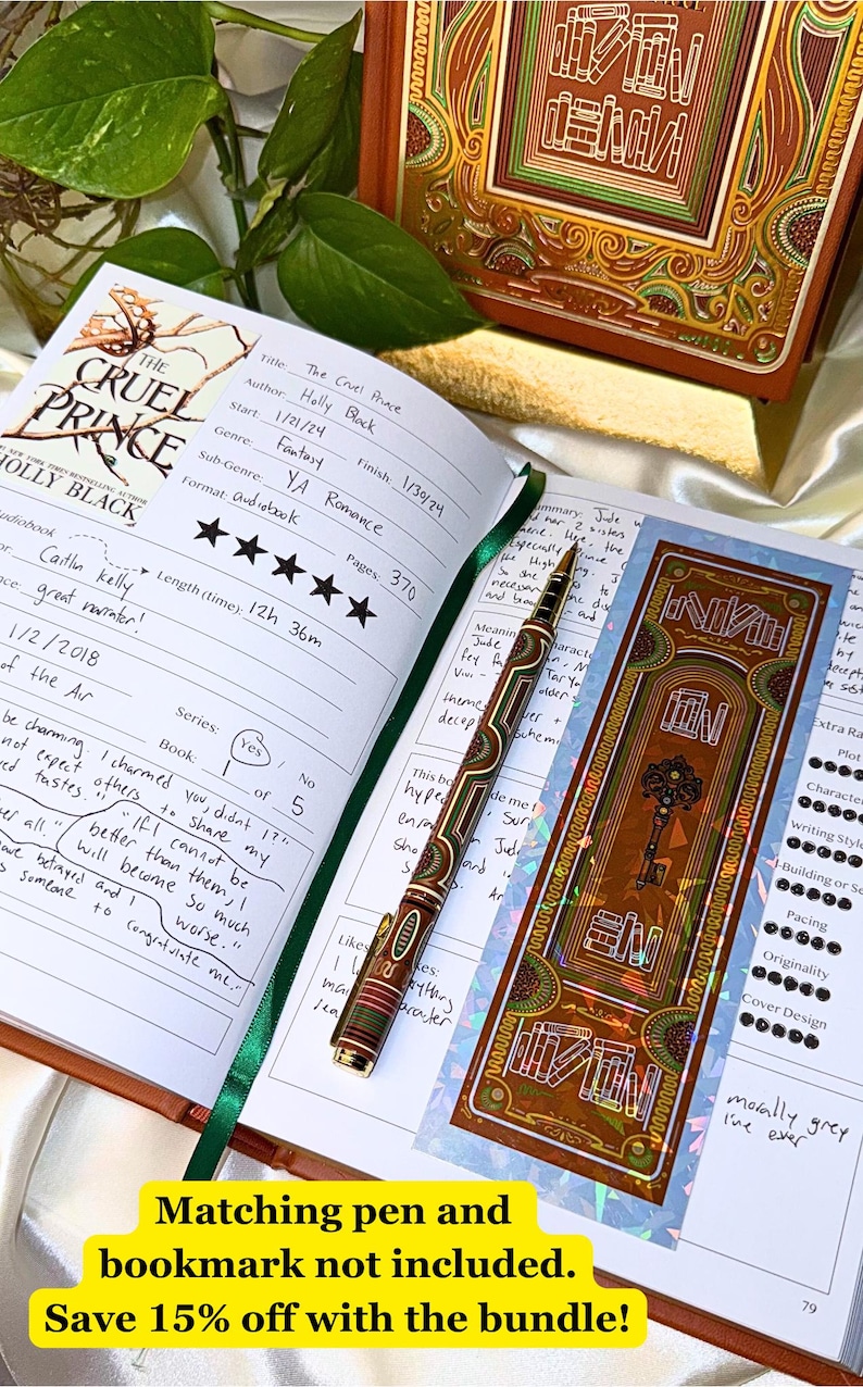 May include: An open journal with handwritten notes and a green ribbon. A decorative pen and bookmark with a key design are next to the journal. The book is titled "The Cruel Prince" by Holly Black.