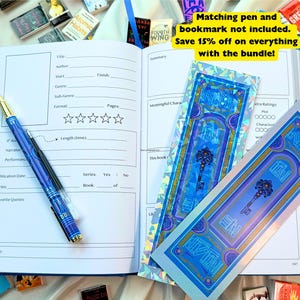 May include: An open blue journal with a detailed layout, a blue pen, and two decorative bookmarks featuring a key design. The journal is surrounded by miniature books. The text on the bookmarks reads "END".