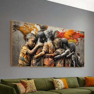 May include: A framed canvas print depicts a group of children embracing, set against a world map background. The children are rendered in warm tones, with a focus on their connection. The map features vibrant colors, adding depth and visual interest to the artwork.