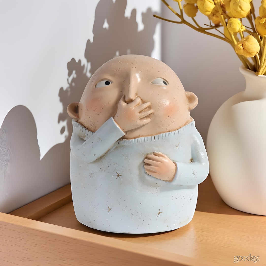 Boy Holding Nose Sculpturenull