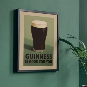 May include: A vintage-style poster with a green background featuring a glass of Guinness beer with the text "GUINNESS IS GOOD FOR YOU".