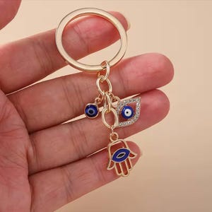 Türkischer Schlüsselanhänger mit bösem Blick – Retro-Hamsa-Handanhänger für Frauen und Mädchen, Taschenaccessoire, Glücksamulett-Geschenk