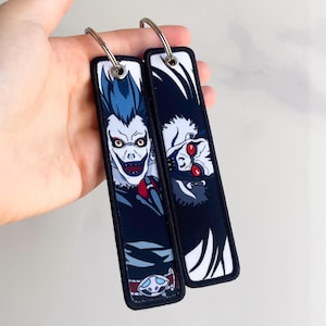 Anime Schlüsselanhänger gestickt Jet Tag