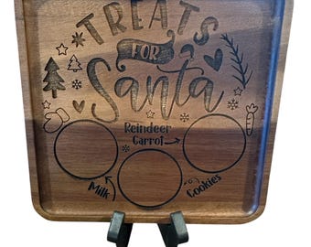 Navidad, dulces para Papá Noel, plato de madera.