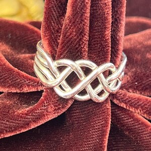 Anillo rompecabezas pesado de 4 piezas en plata de ley imagen 2